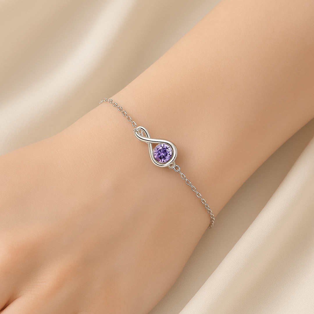 سوار فضي بتصميم لا نهائي بحجر بنفسجي لامع