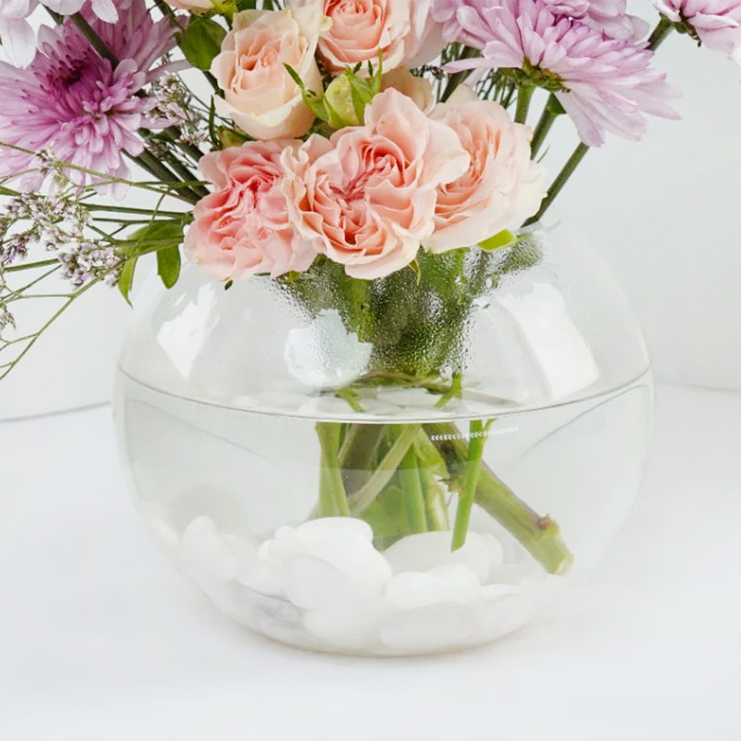 Radiant Femme Sphere: Elegant Floral Arrangement in Fish Bowl