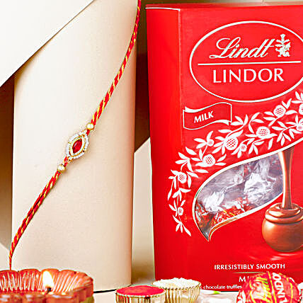 Elegant Red Gemstone Mauli Rakhi with Lindt Lindor Chocolate Combo