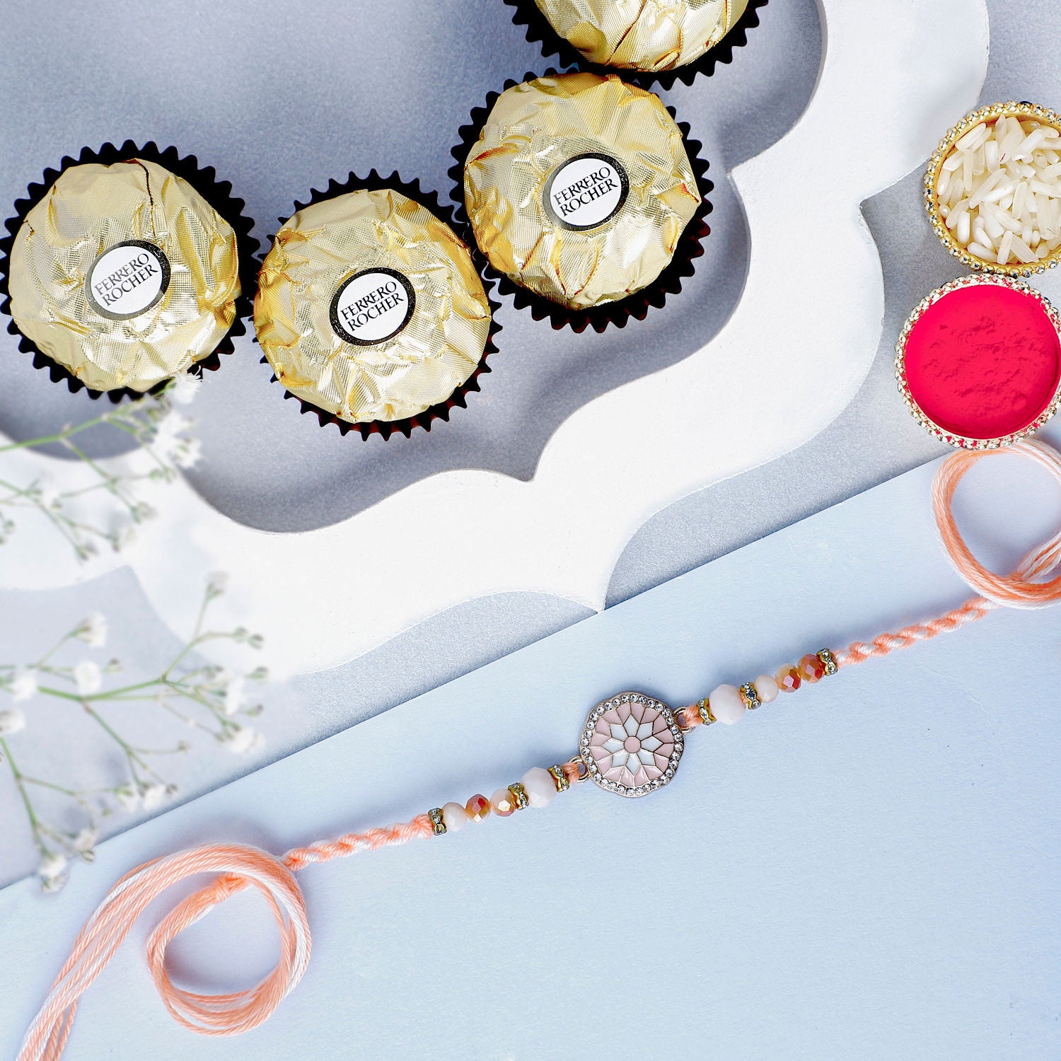 Rosy American Diamond Rakhi N Ferrero Delight