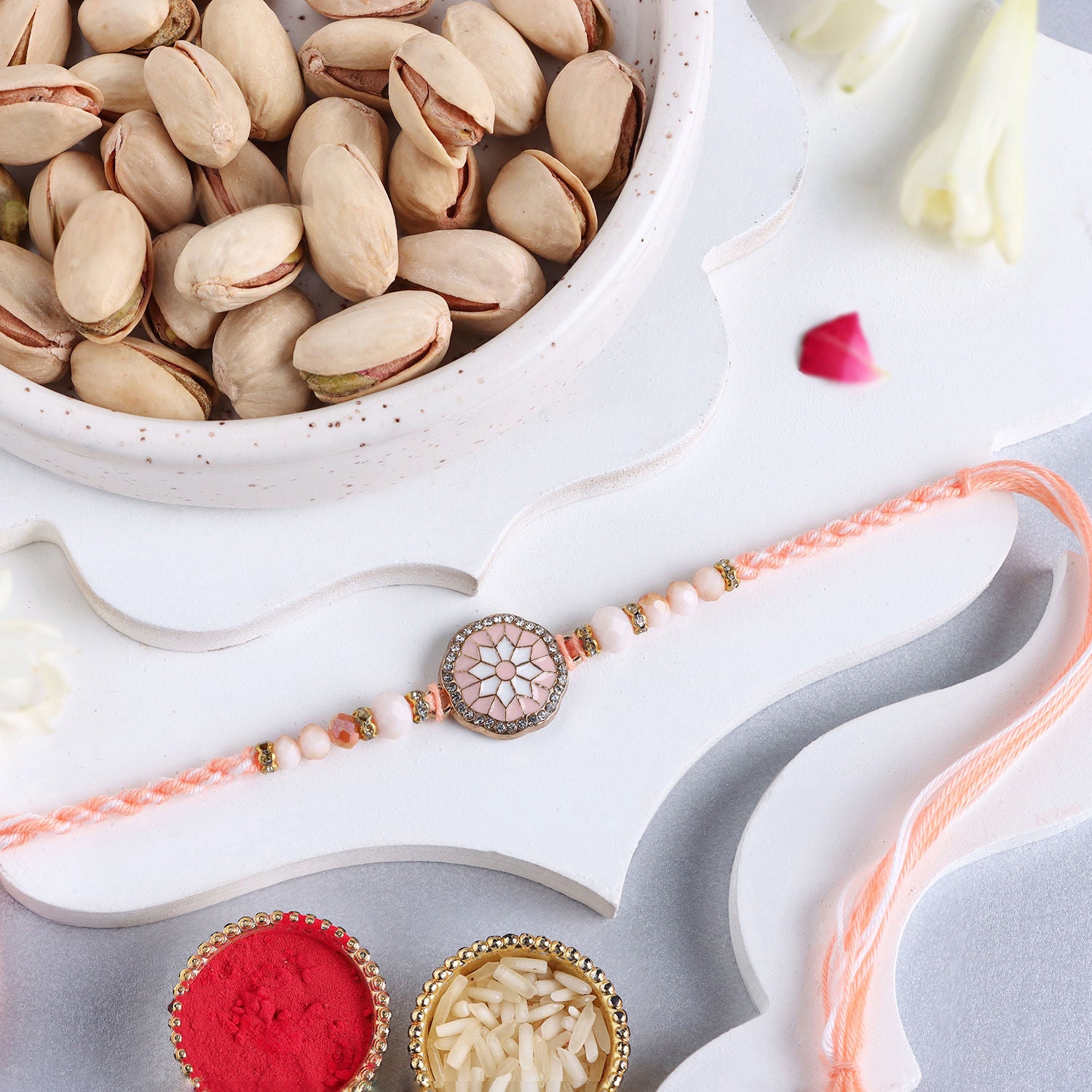 Rosy American Diamond Rakhi N Pistachio Combo