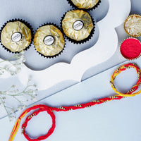 Elegant Sacred Beadwork Mauli Rakhi with Ferrero Rocher Delights - Perfect Raksha Bandhan Gift