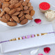 Sneh Regular Ethnic Pearl Rakhi with Almonds