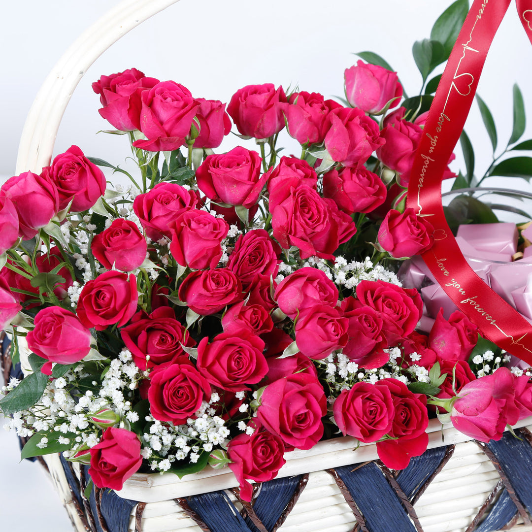 Elegant Basket with Dark Pink Spray Roses and Gourmet Chocolates