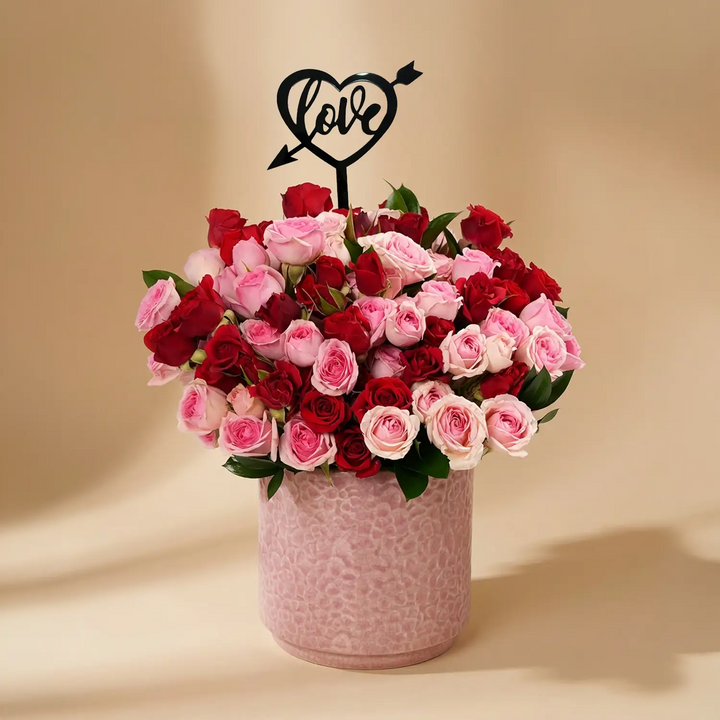 Sweet Embrace Red and Pink Spray Roses in Elegant Pink Vase