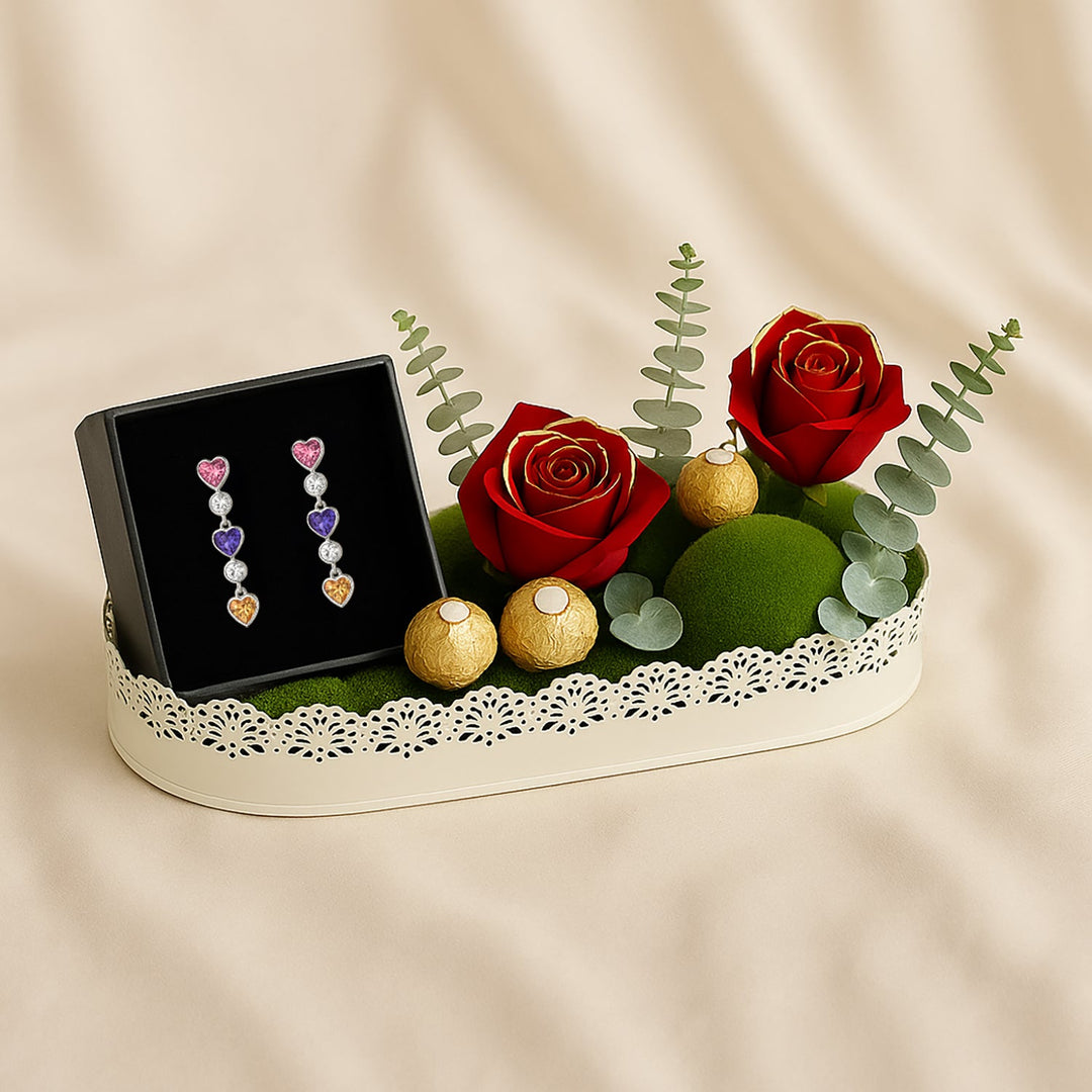 أقراط هارتفال الأنيقة مع ورود حمراء وعلبة هدايا فيريرو روشيه