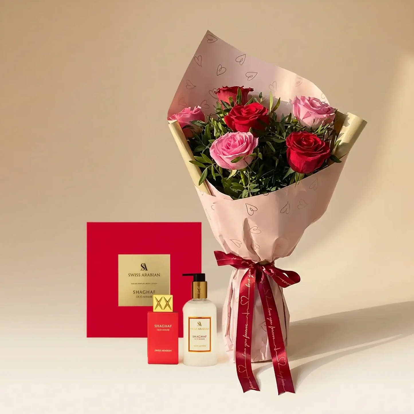 رومانسية أبدية: باقة ورود وردية وحمراء مع طقم هدية شغف عود أحمر