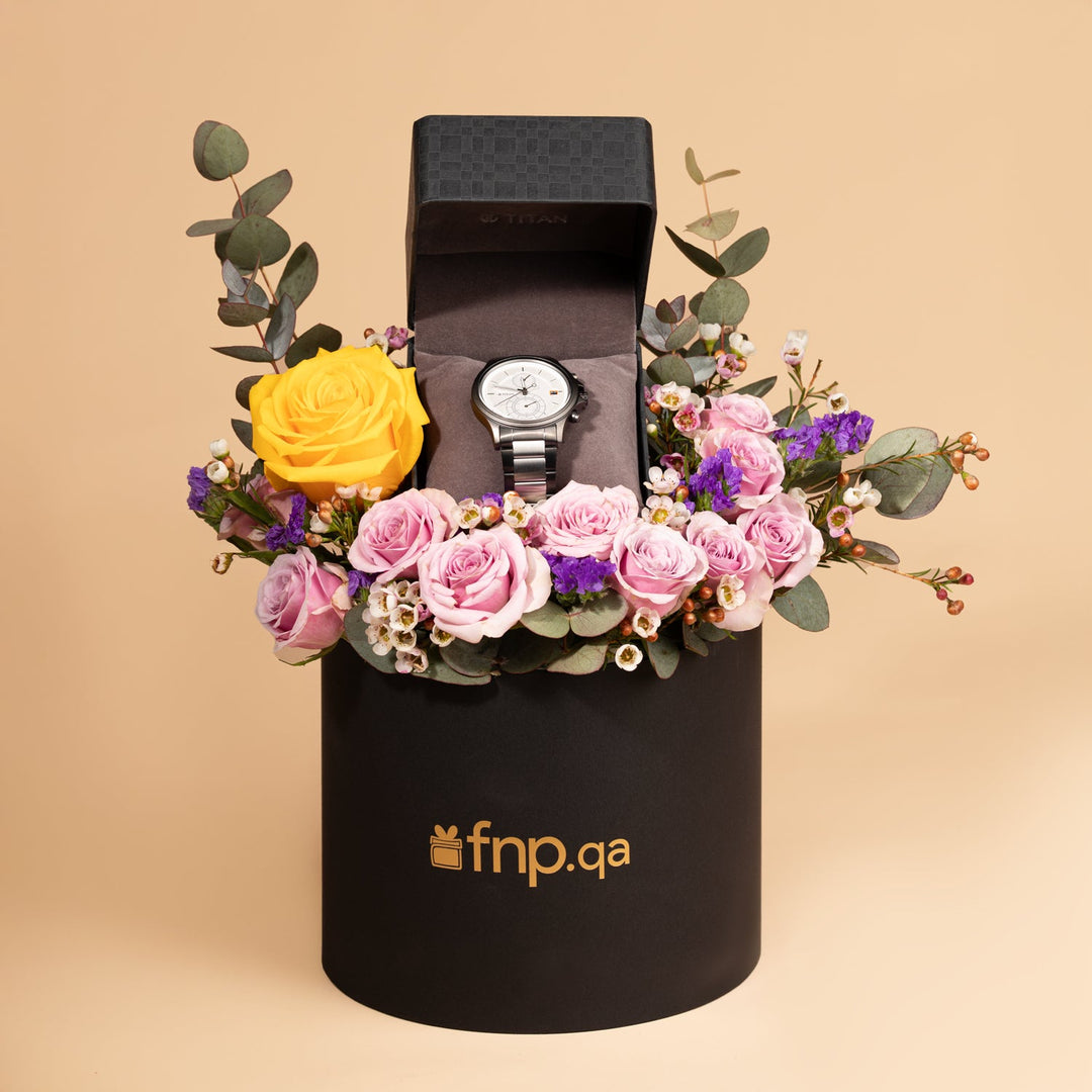 Titan Quartz Analog Men's Watch with Silver Dial and Stainless Steel Strap, Presented in an Elegant Floral Arrangement