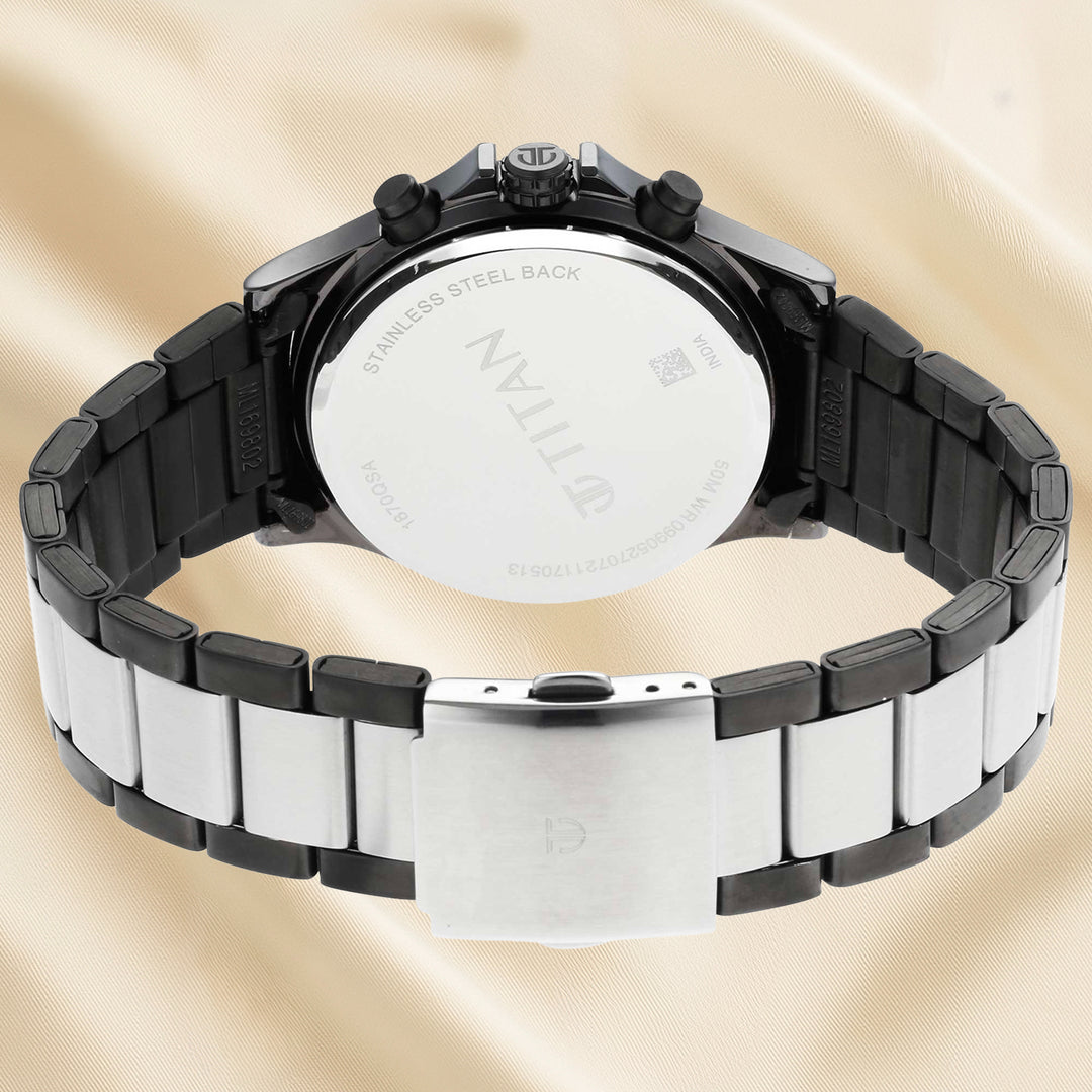 Titan Quartz Analog Men's Watch with Silver Dial and Stainless Steel Strap, Presented in an Elegant Floral Arrangement