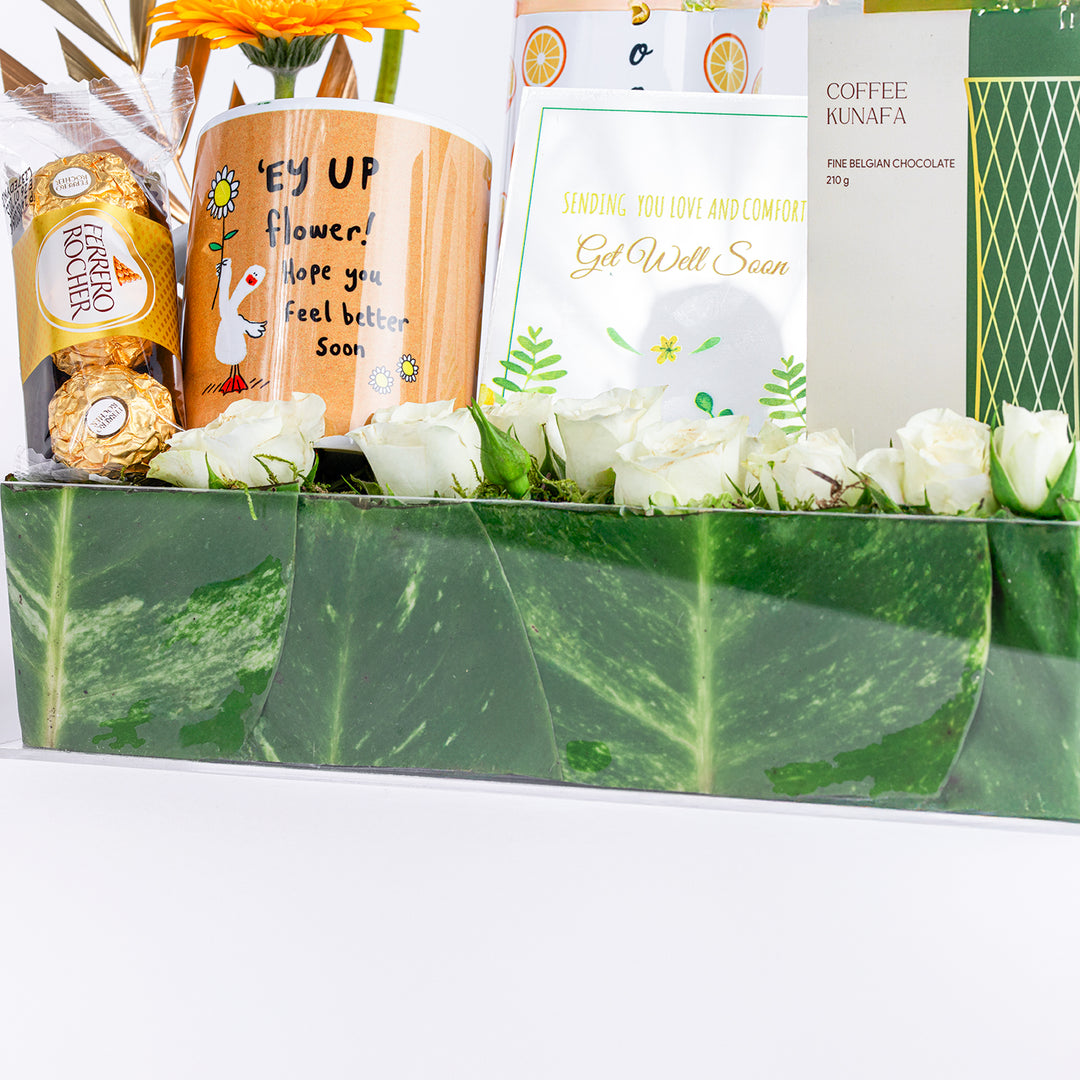العافية والأماني: مجموعة هدايا تعافي مع الزهور والشوكولاتة والمزيد