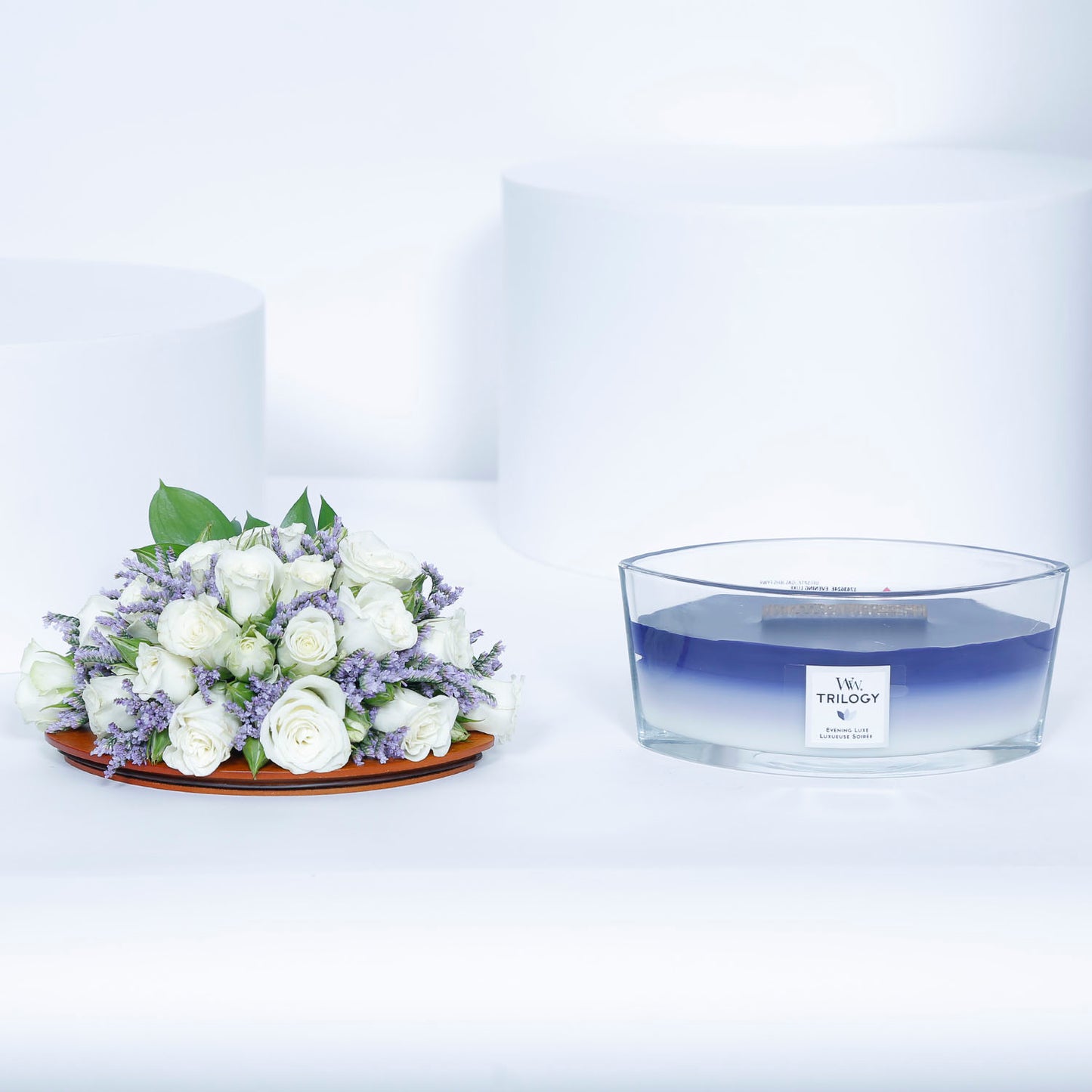 WoodWick Ellipse Candle - Evening Luxe with Elegant Floral Arrangement