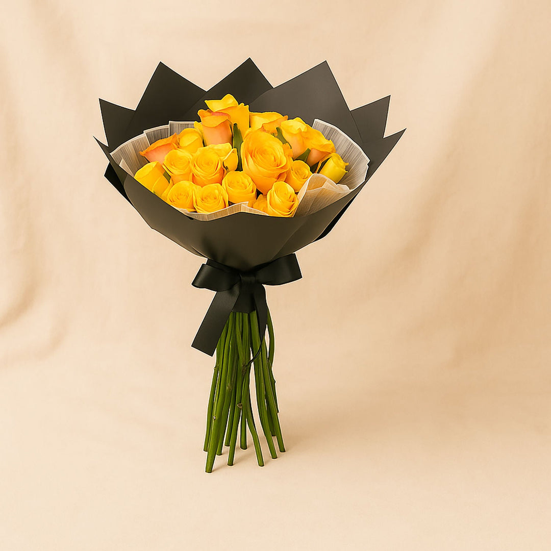 باقة من الورود الصفراء والبرتقالية مع مجموعة هدايا شوكولاتة فيريرو روشيه الفاخرة