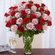 Luxurious Bouquet of 50 Vivid Red and Pink Roses in Elegant Glass Vase