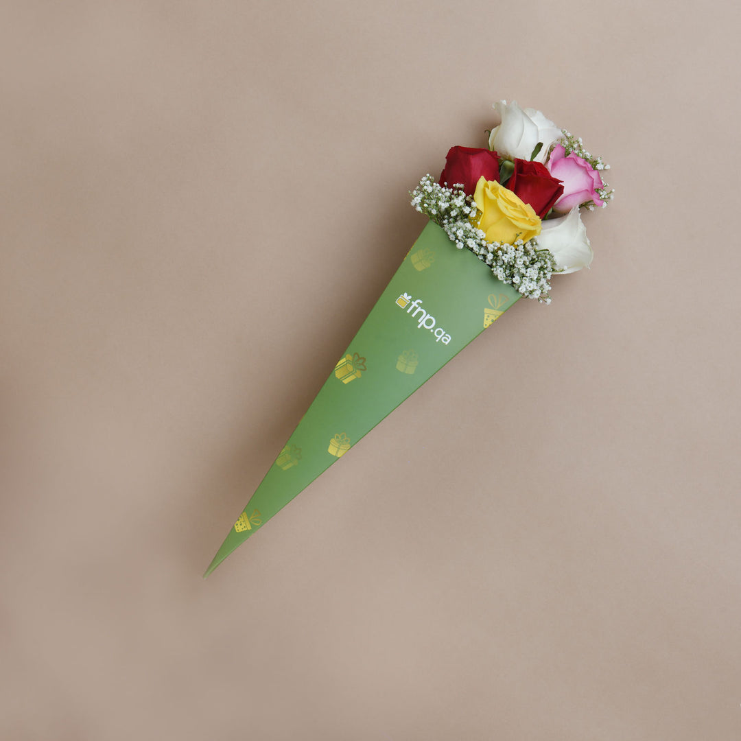 Vibrant Mixed Color Roses in Elegant Green Sleeve