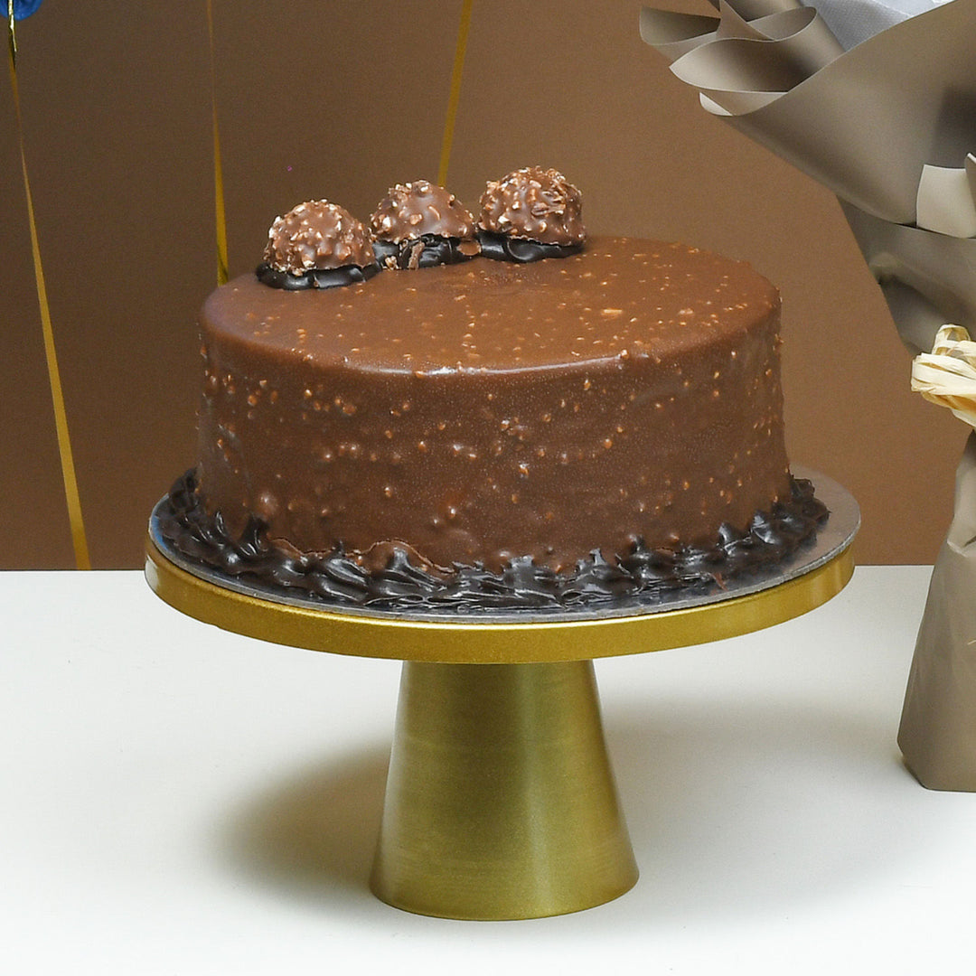 باقة مفاجأة عيد الميلاد الفاخرة: ورود، كعكة، بالونات وشوكولاتة