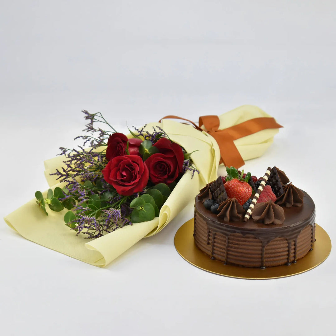 Decadent Chocolate Fudge Cake with Elegant Red Rose Bouquet