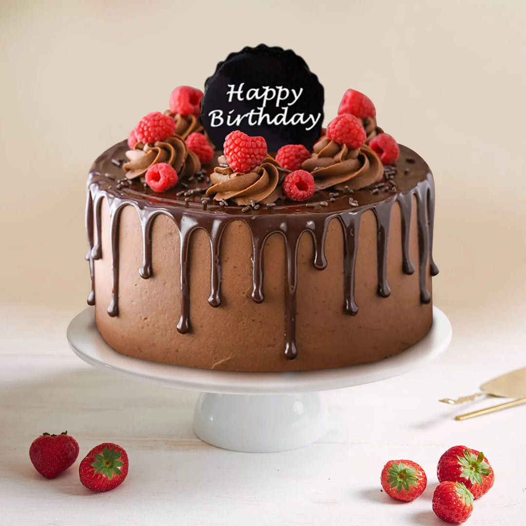 Decadent Dripping Chocolate Birthday Cake with Fresh Raspberries