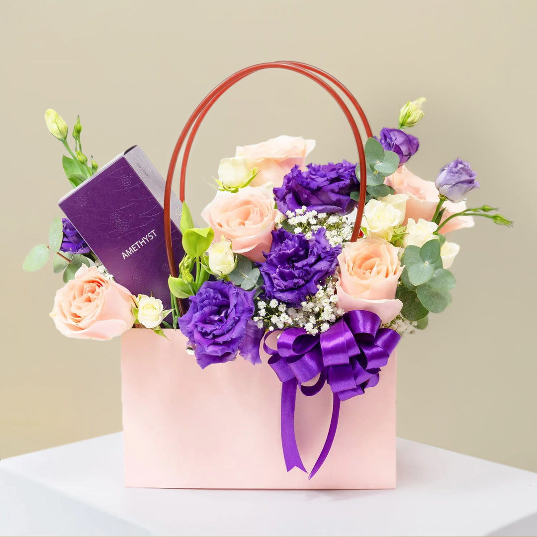 Elegant Peach and Purple Flower Arrangement with Amethyst Perfume