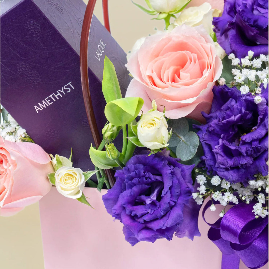 Elegant Peach and Purple Flower Arrangement with Amethyst Perfume