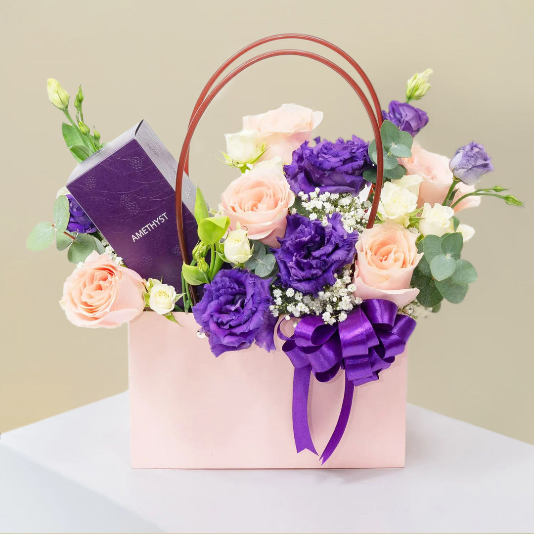 Elegant Peach and Purple Flower Arrangement with Amethyst Perfume