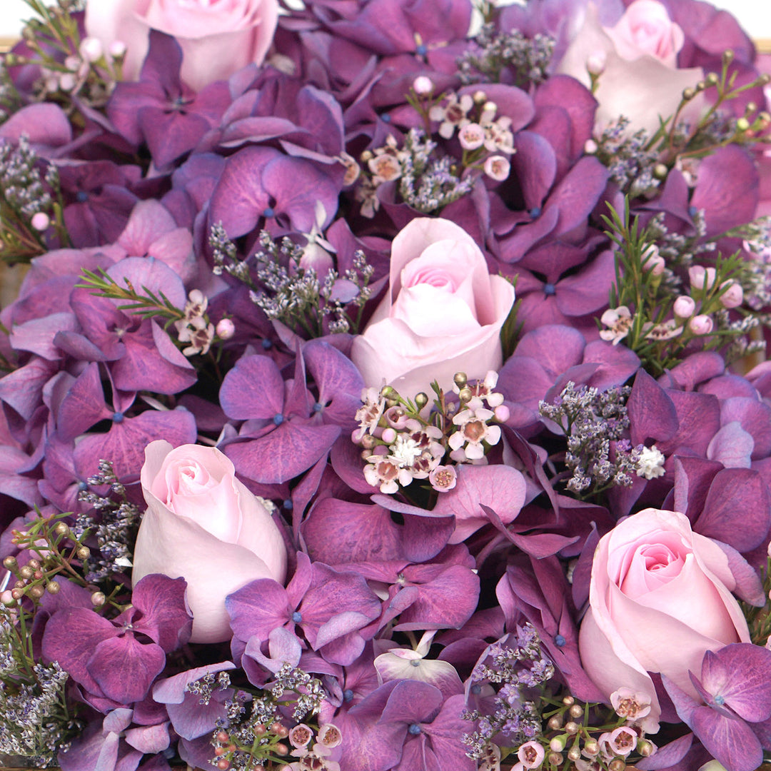 Elegant Mixed Flowers and Chocolates on a Luxurious Golden Tray