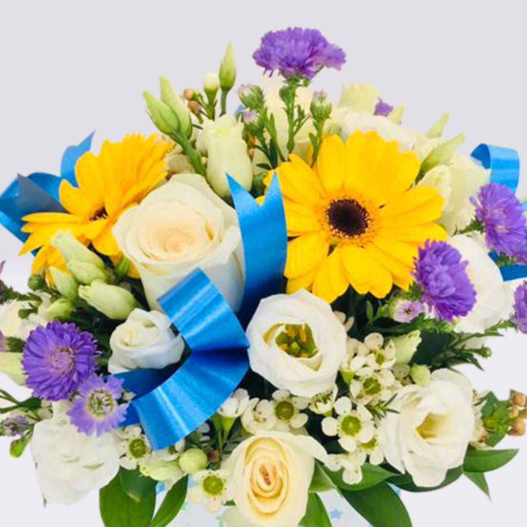 مزهرية زهور متنوعة - ولد جديد بإطلالة رائعة