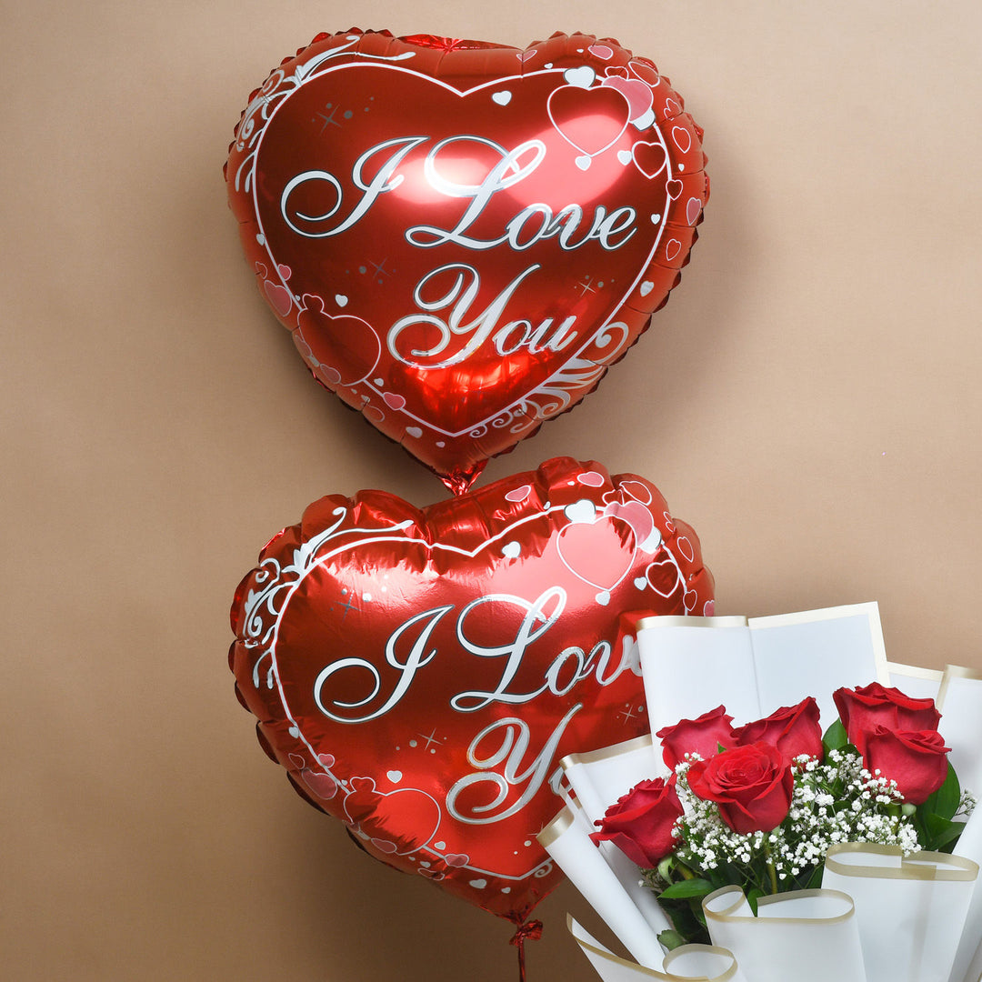 باقة حب حمراء وهدايا مفاجأة حلوة