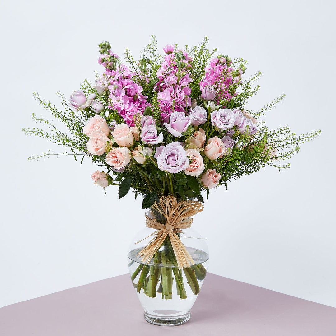 Elegant Pastel Floral Arrangement in Glass Vase