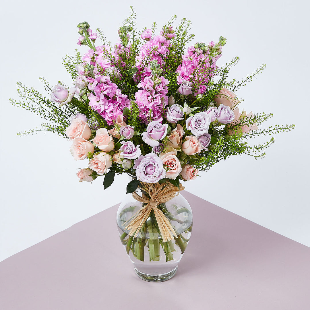 Elegant Pastel Floral Arrangement in Glass Vase