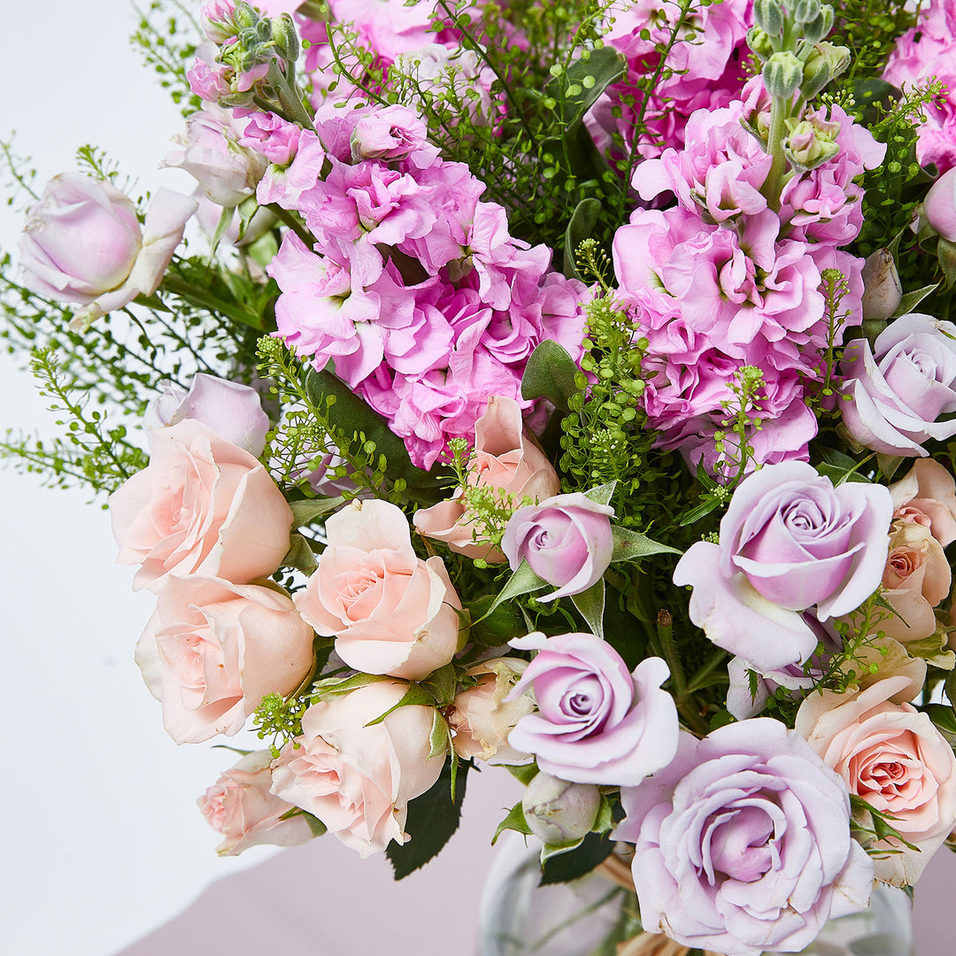 Elegant Pastel Floral Arrangement in Glass Vase