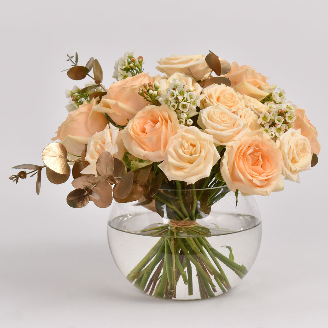 Elegant Peach Roses Table Centerpiece in Glass Bowl