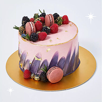Gourmet Red Velvet Dream Cake with Fresh Berries and Macarons