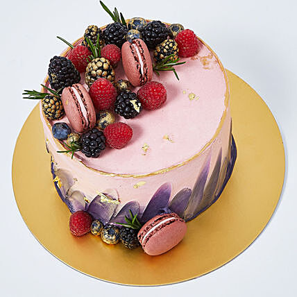 Gourmet Red Velvet Dream Cake with Fresh Berries and Macarons