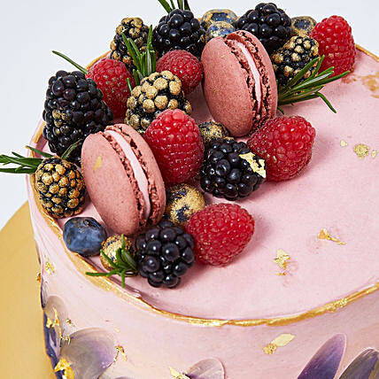 Gourmet Red Velvet Dream Cake with Fresh Berries and Macarons