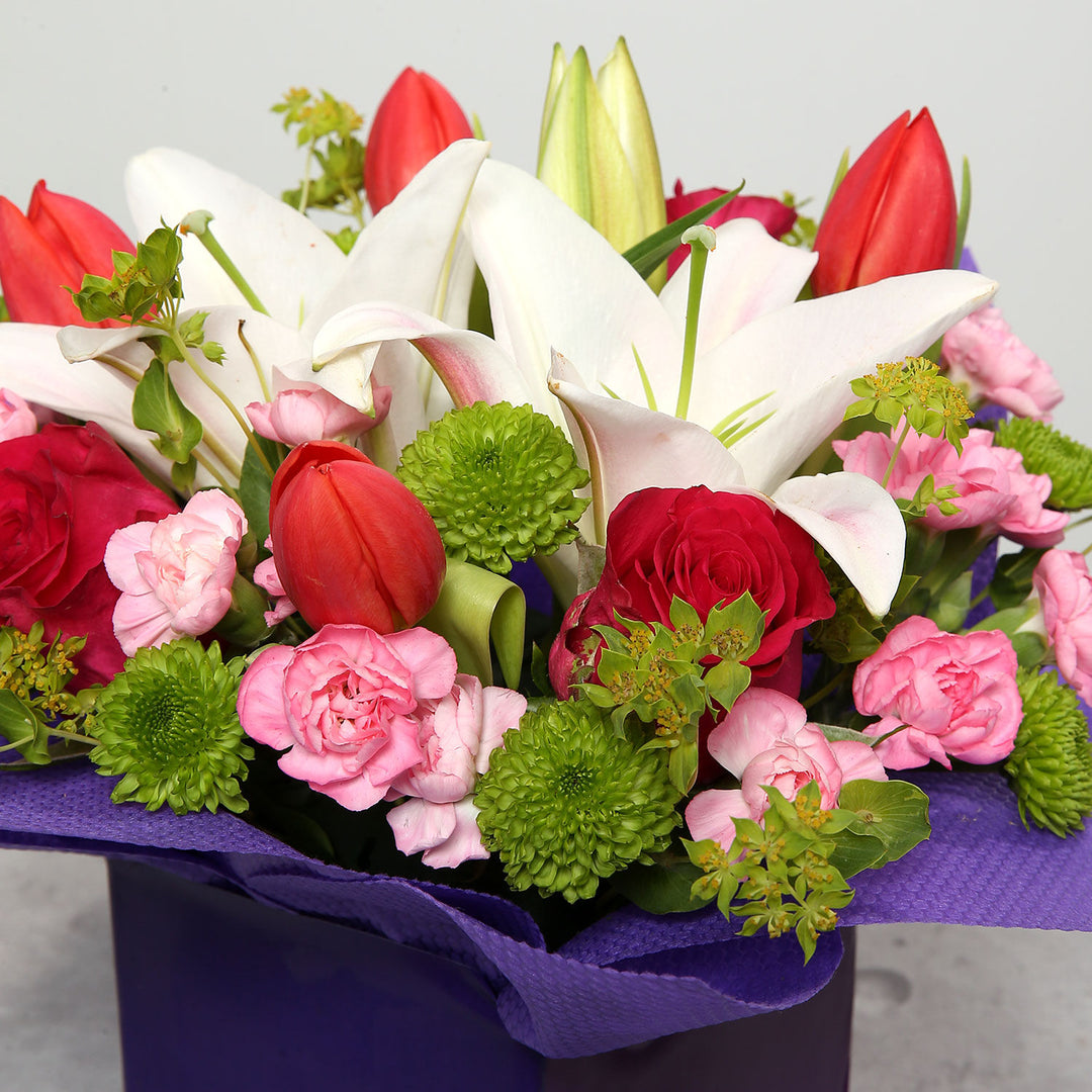 Elegant Tulips, Roses, and Carnations in a Glass Vase - Perfect Anniversary Gift
