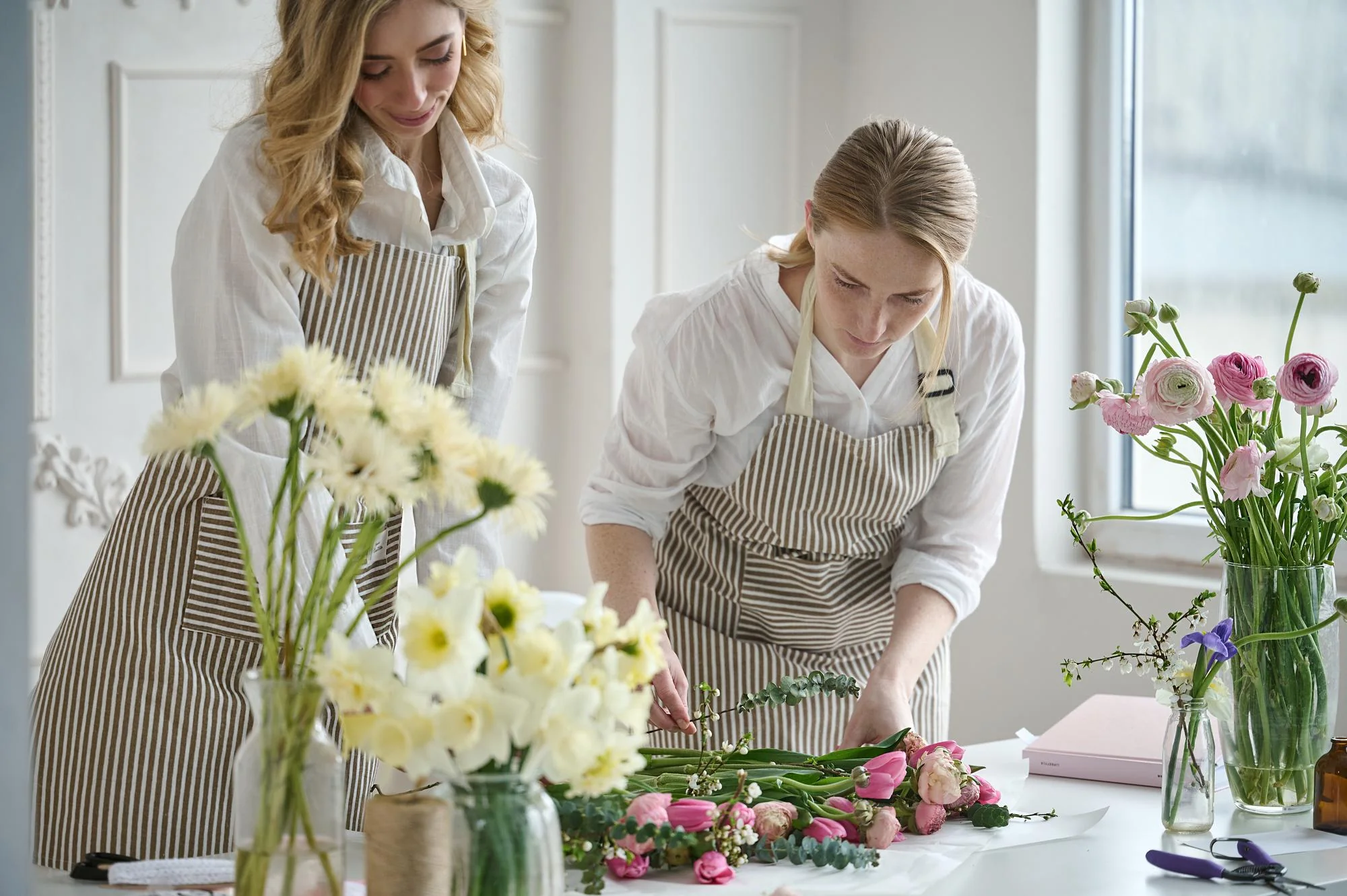 FNP florists arranging flowers